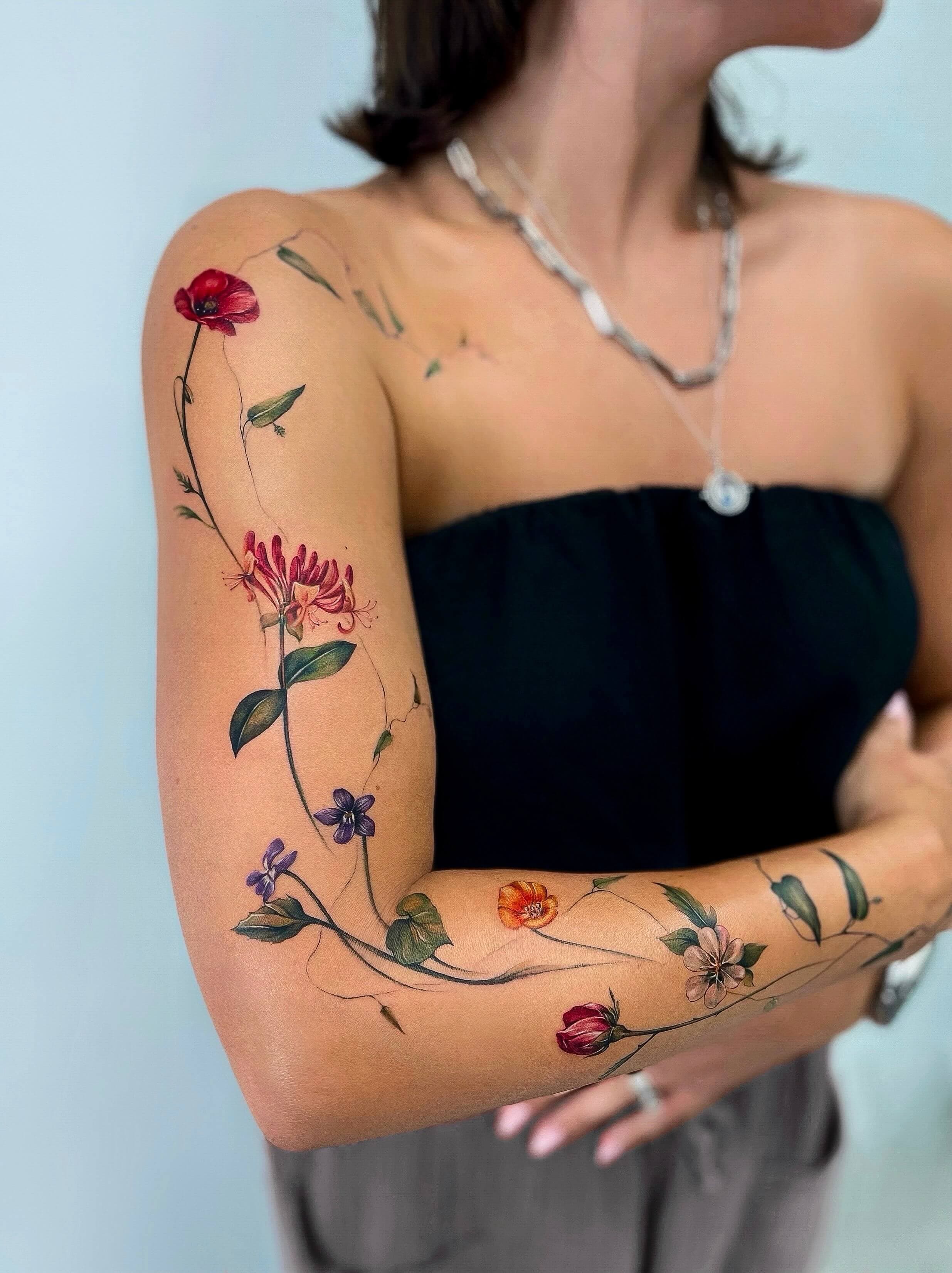 Tattoo left 0